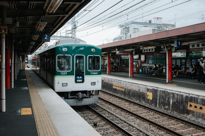 train at fushimi inari station kyoto