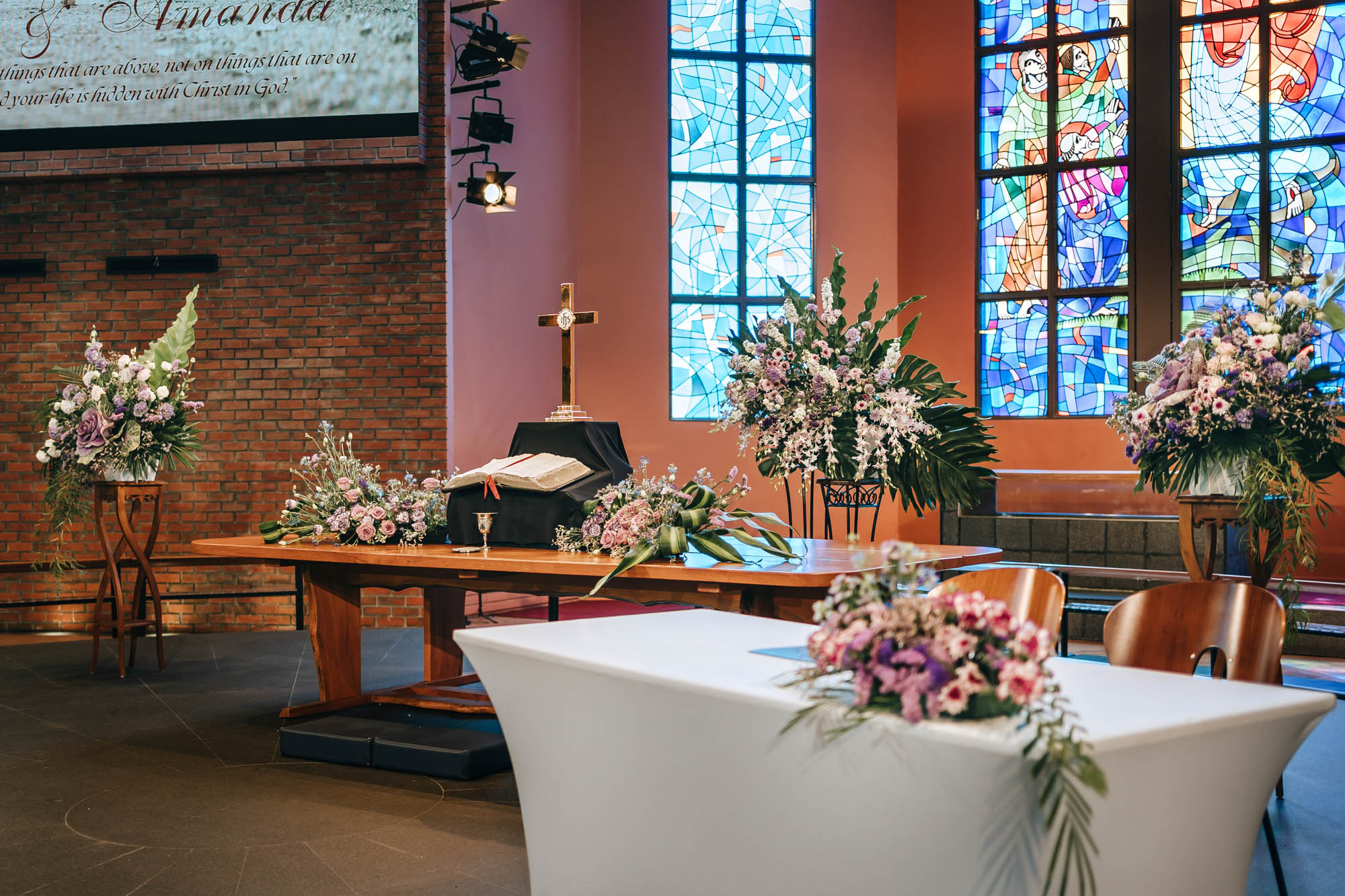 beautiful church sanctuary decorated with fresh flowers