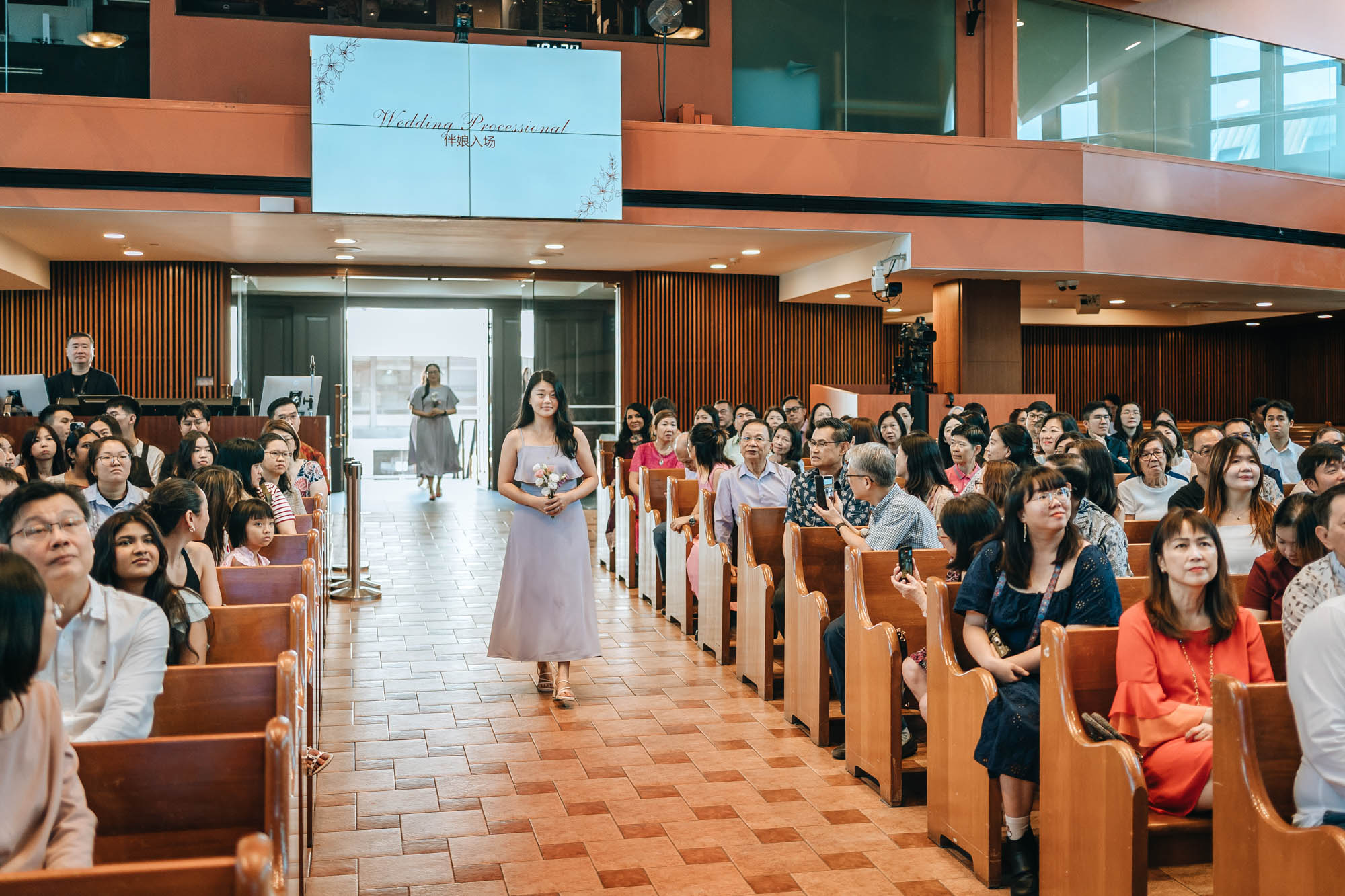 bridesmaids enter as the ceremony begins