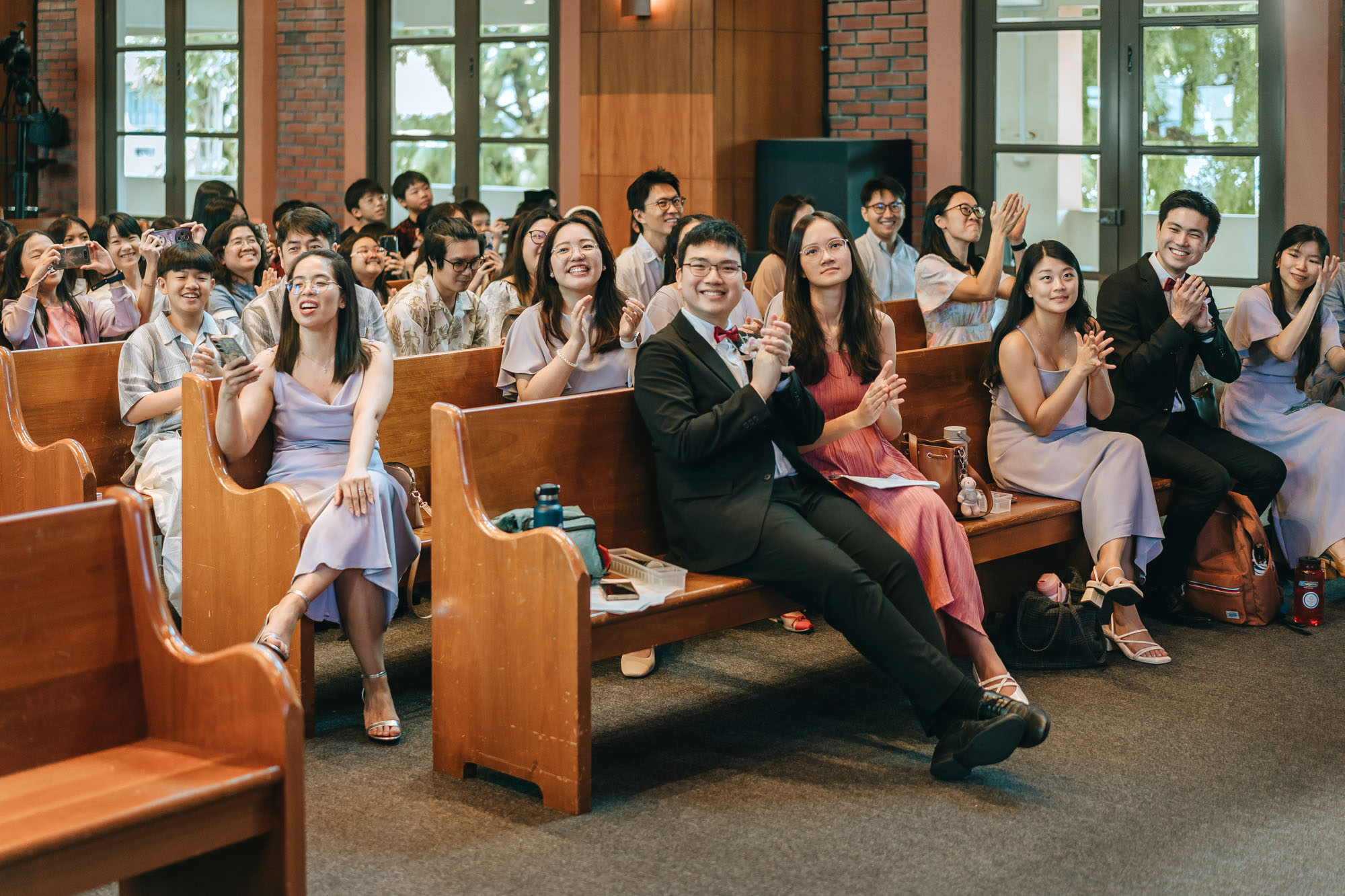wedding guests clapping