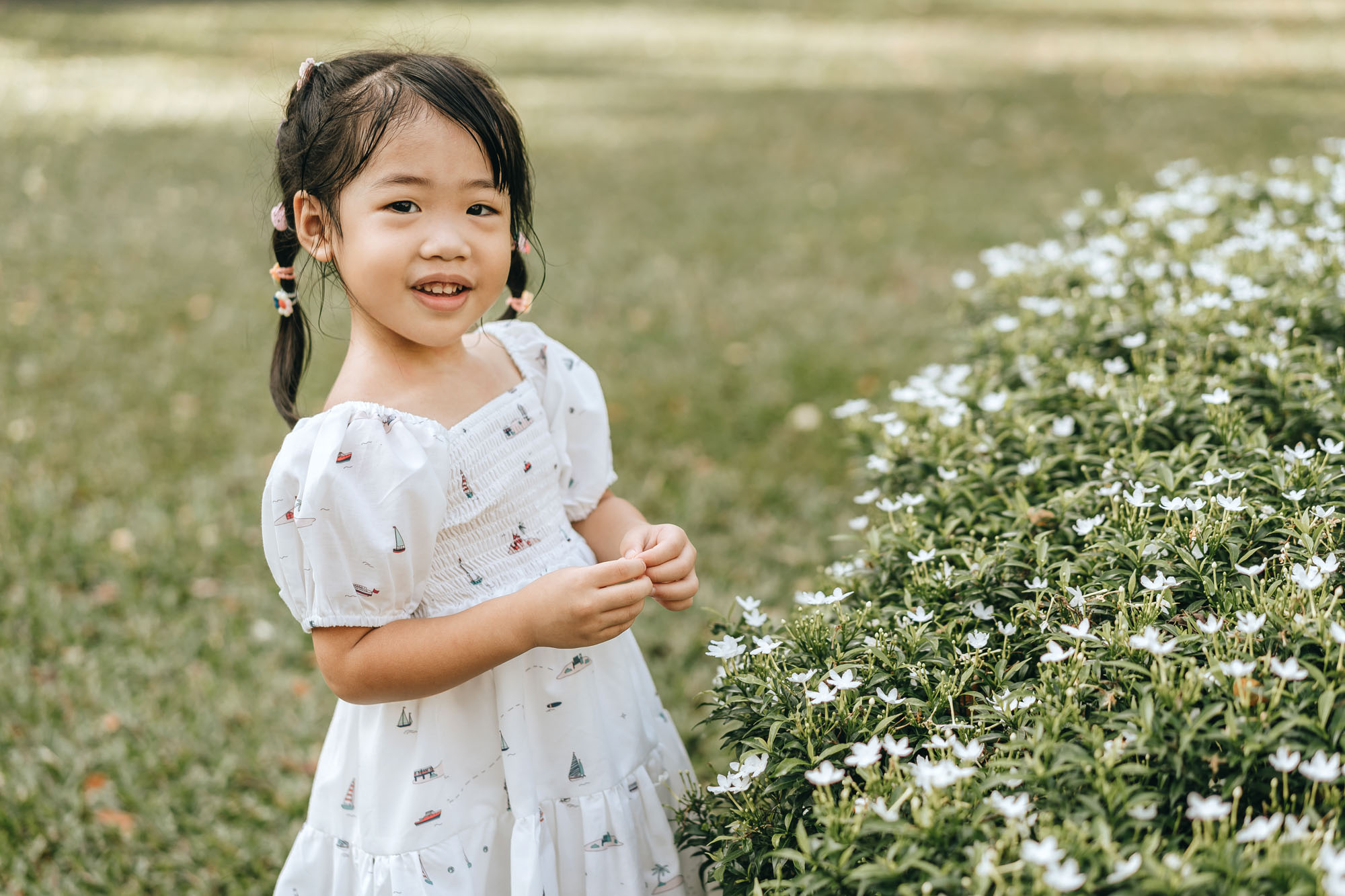 little girl and flowers