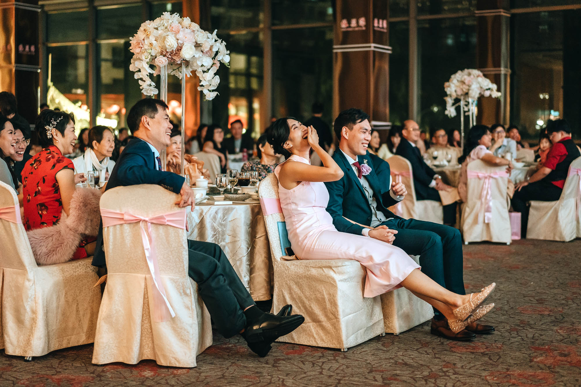 couple laughs as they watched the SDE video